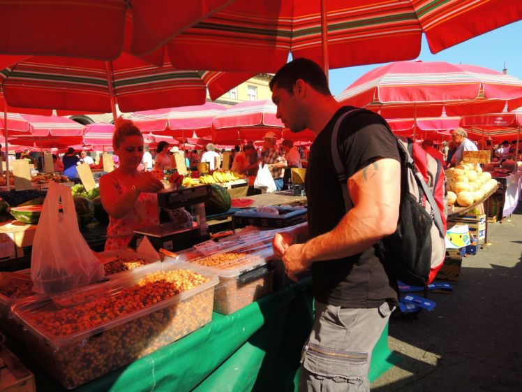 Jonathan buying fruit for our lunch