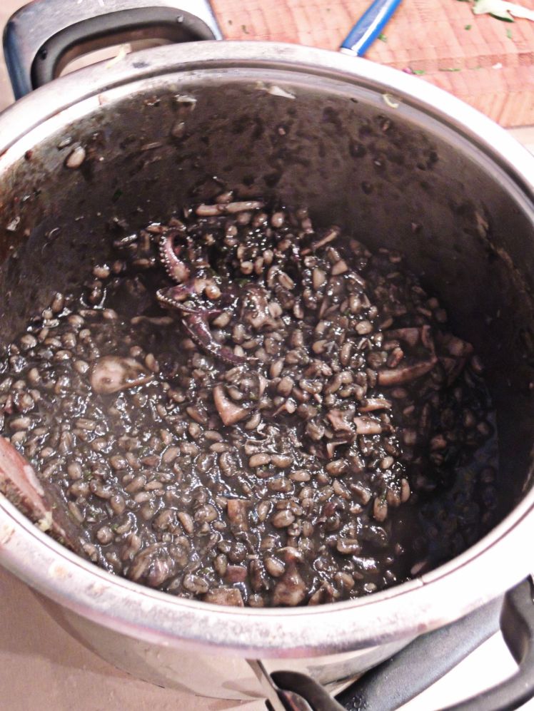 My favorite dish - cuttlefish risotto!  And not just because I got to watch Jonathan burst all the ink sacs...