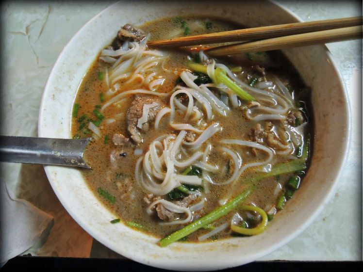 Pho on Bat Dan Street.  More subtle and less fragrant than other places but certainly fulfills any need for a comforting bowl of beefy goodness.